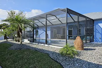 Pool enclosure with modified chair rail by East Coast Aluminum
